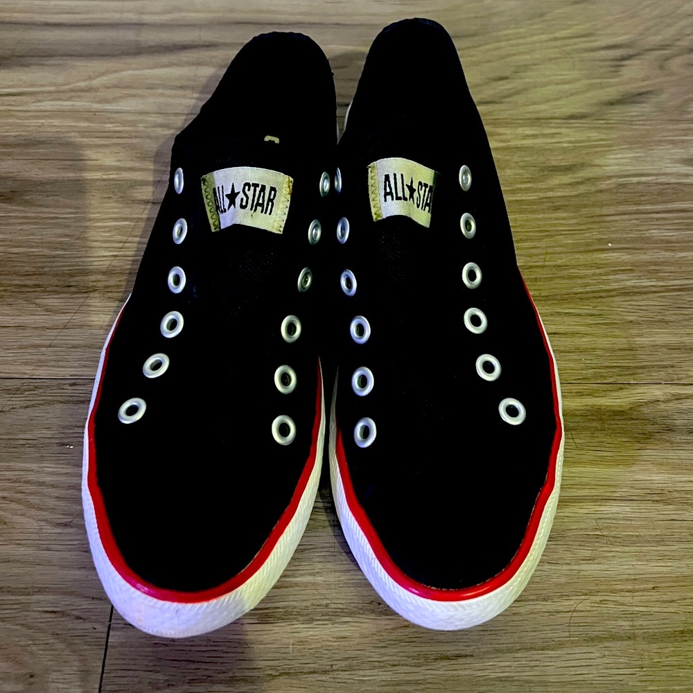Converse All Star Slip-On Canvas Sneakers in Black with Red Trim